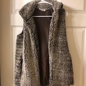 brown fur vest. NEVER WORN.